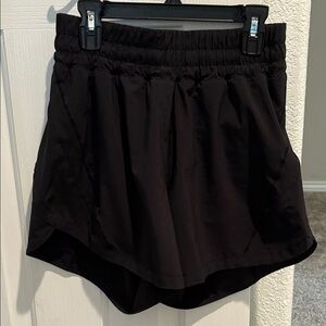 Lululemon truck that high-rise 5 inch black shorts.